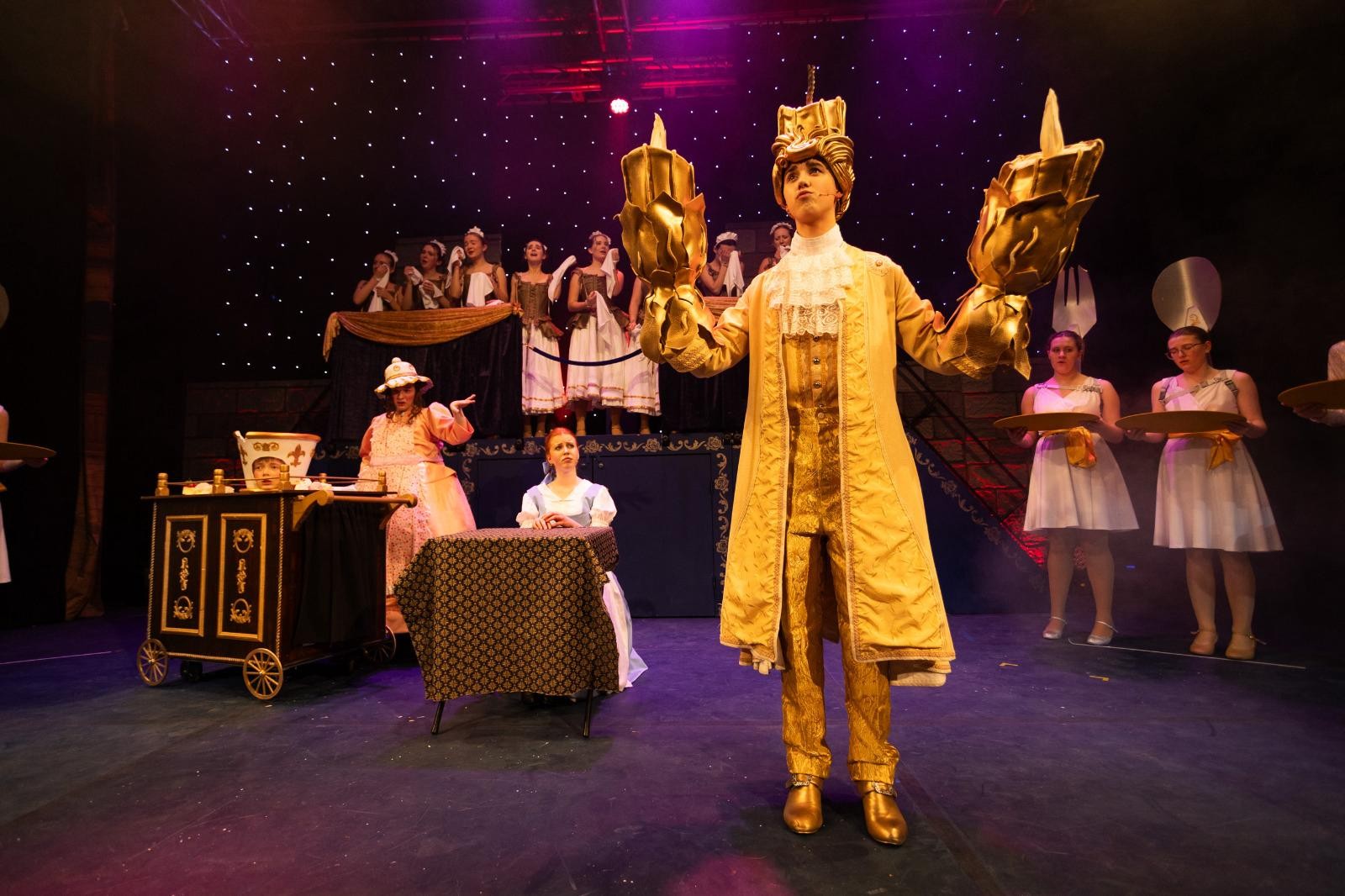 Beauty and the Beast Lumiere candlestick costume hire – Thespis Theatrical Costumiers UK