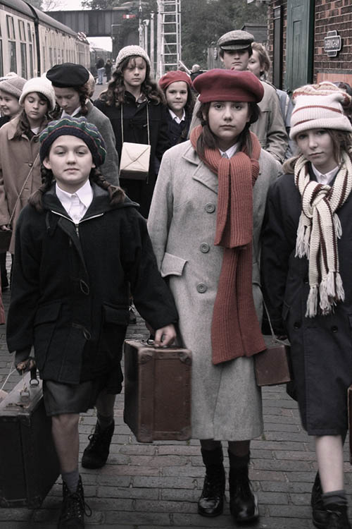 Evacuees on train platform Madison Bicknell Centre