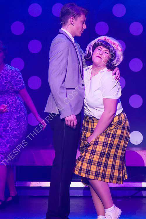Tracey In Yellow Checkered Skirt and Link Dancing . Scene from Hairspray the Musical.