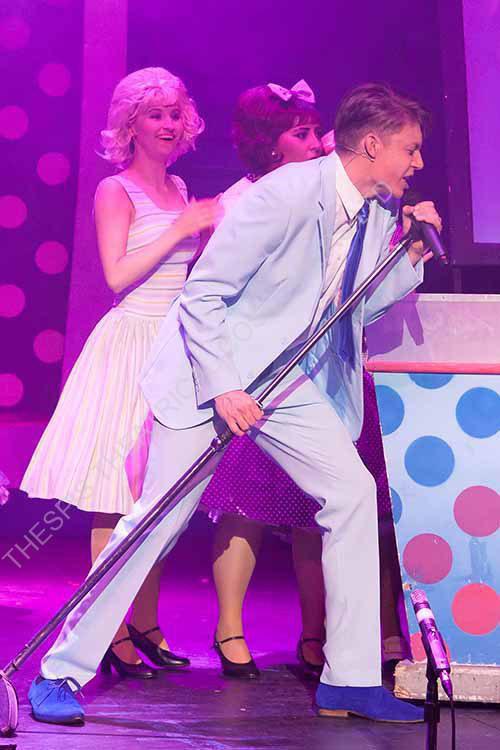 Link Larkin Light blue suit. Hairspray