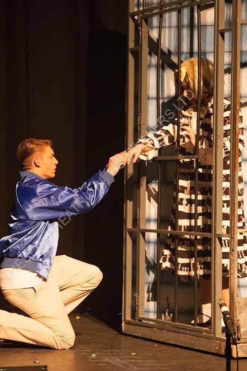 Tracy Turnblad prison costume locked up. Scene from Hairspray.